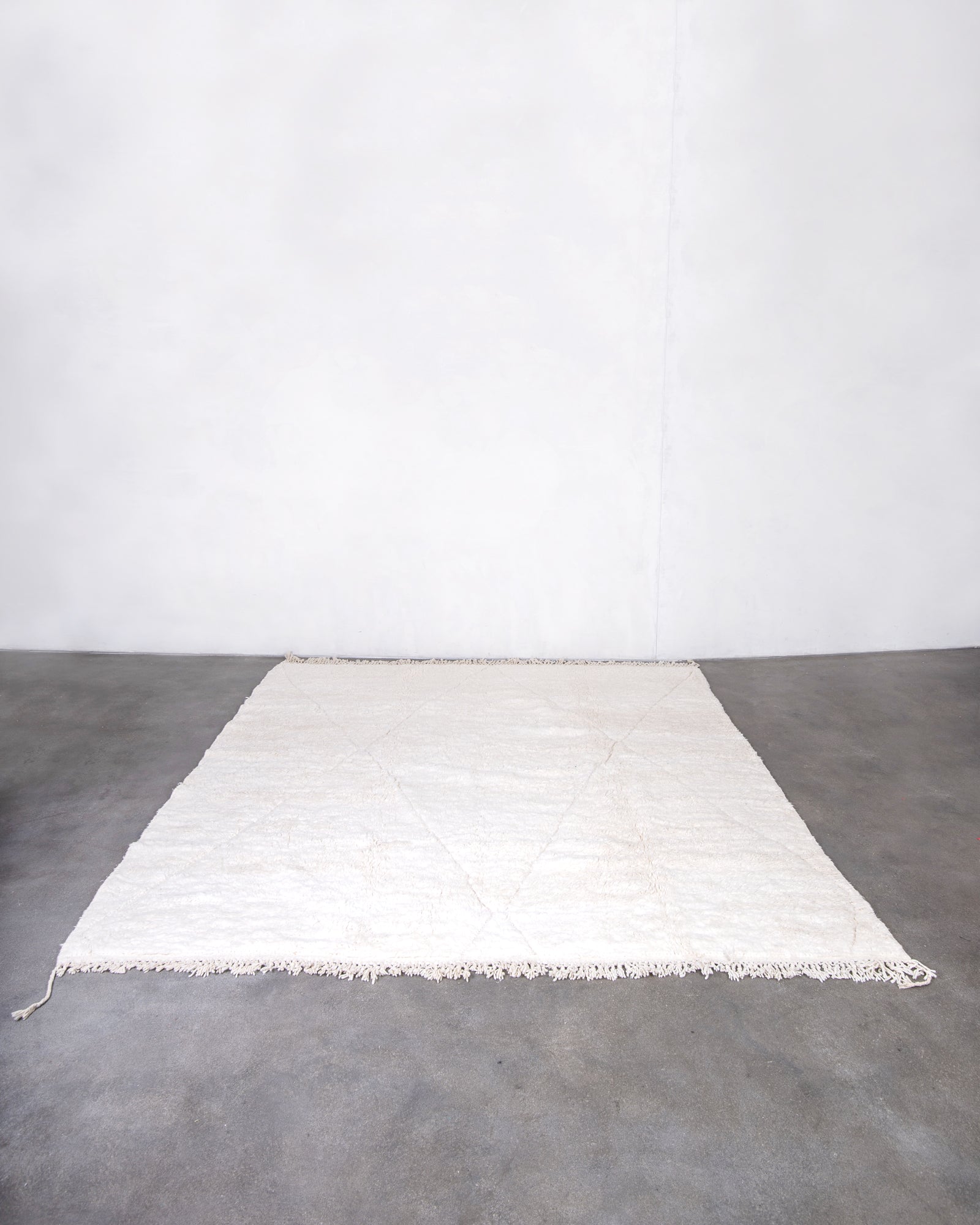 Modern, designer, handcrafted Berber rug from Morocco. Beniourain carpet with beautiful colours and patterns and fluffy wool texture.